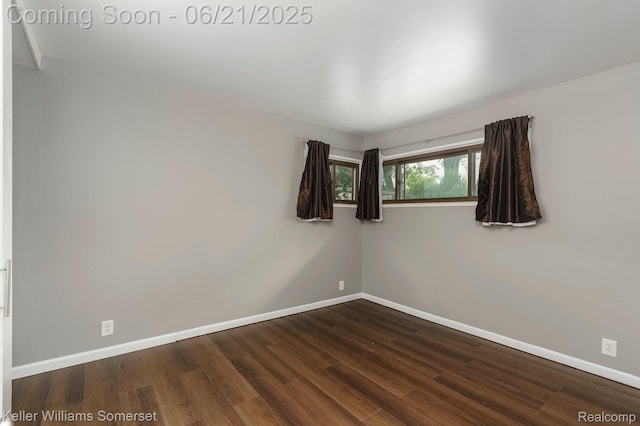 3620 Chester Rd, Royal Oak, MI 48073 - unfurnished room with baseboards and dark wood-style flooring