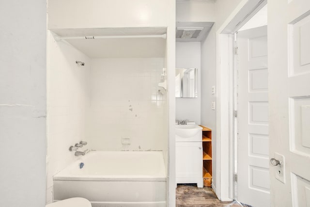 269 Euclid St, Mount Clemens, MI 48043 - bathroom featuring vanity, wood finished floors, and bathing tub / shower combination