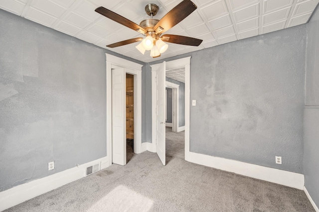 269 Euclid St, Mount Clemens, MI 48043 - unfurnished bedroom featuring carpet flooring and a ceiling fan