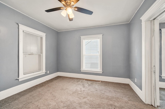 269 Euclid St, Mount Clemens, MI 48043 - carpeted empty room with ornamental molding and ceiling fan
