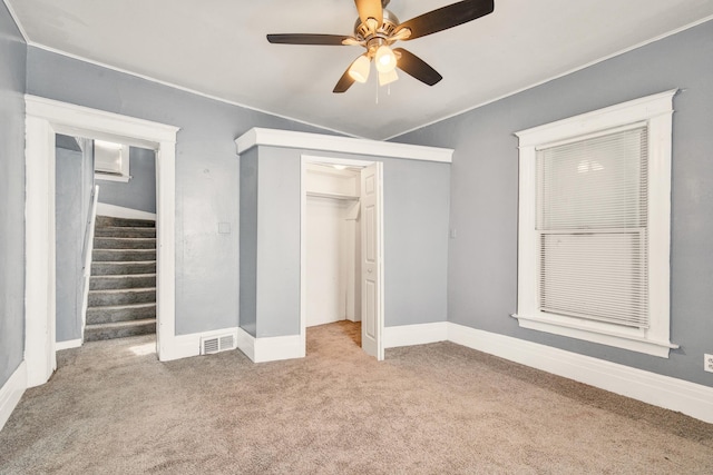 269 Euclid St, Mount Clemens, MI 48043 - unfurnished bedroom featuring carpet floors, a closet, a ceiling fan, and crown molding