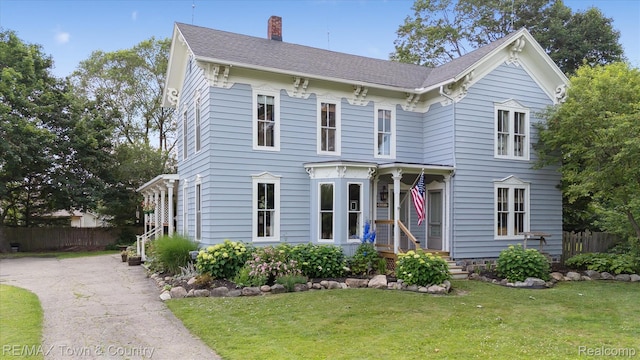 6501 River Rd, Flushing, MI 48433 - italianate home featuring a chimney