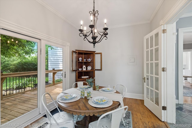 6501 River Rd, Flushing, MI 48433 - dining room featuring crown molding, a chandelier, and wood finished floors