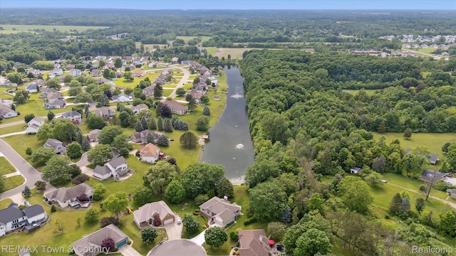 6501 River Rd, Flushing, MI 48433 - aerial overview of property's location featuring a nearby body of water and nearby suburban area