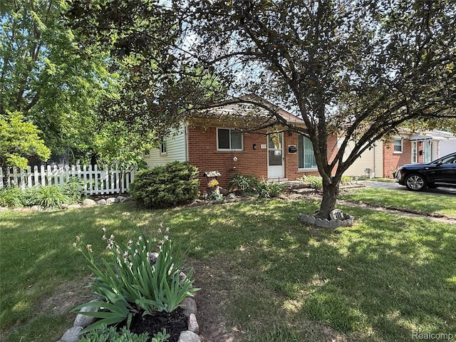 400 W Hudson Ave, Madison Heights, MI 48071 - view of property hidden behind natural elements featuring brick siding