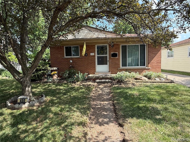 400 W Hudson Ave, Madison Heights, MI 48071 - view of front of property featuring brick siding and a front yard