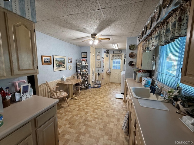 400 W Hudson Ave, Madison Heights, MI 48071 - kitchen featuring a paneled ceiling, ceiling fan, light countertops, light floors, and washer / clothes dryer