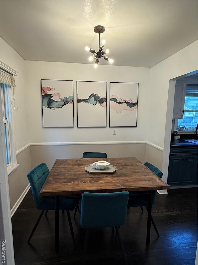 3355 Garden Ave, Royal Oak, MI 48073 - dining area featuring a chandelier and wood finished floors