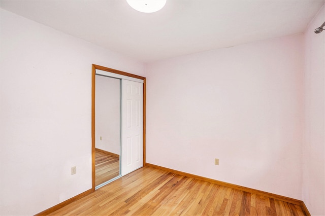 15770 157th Ave, Big Rapids, MI 49307 - spare room with baseboards and light wood-style floors