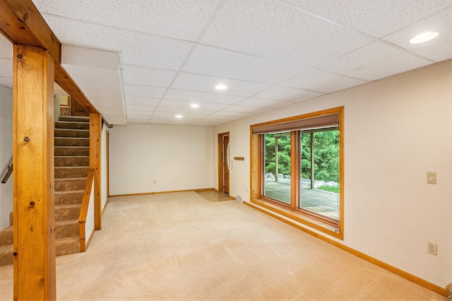 15770 157th Ave, Big Rapids, MI 49307 - empty room featuring stairs, light carpet, recessed lighting, and a paneled ceiling