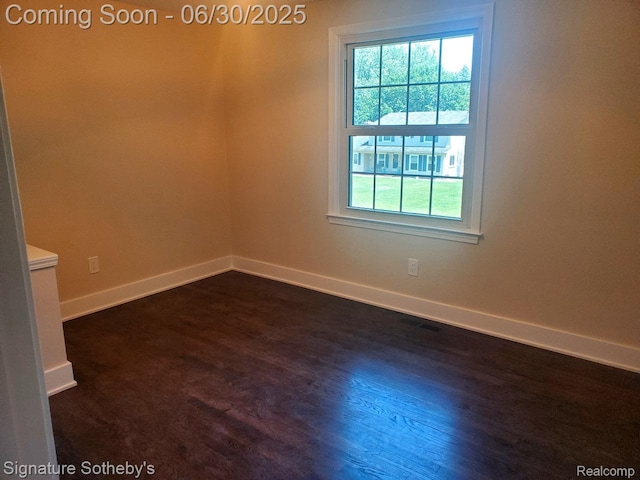 2200 Brenthaven Dr E, Bloomfield, MI 48304 - empty room featuring baseboards and dark wood-style flooring
