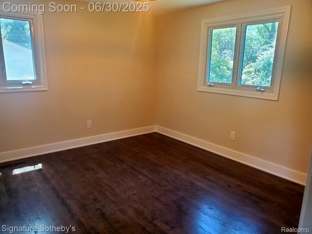 2200 Brenthaven Dr E, Bloomfield, MI 48304 - spare room with baseboards and dark wood-style flooring