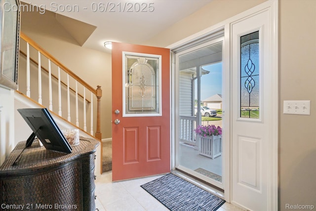 9145 Woodridge Dr, Davison, MI 48423 - entrance foyer with stairway and light tile patterned floors
