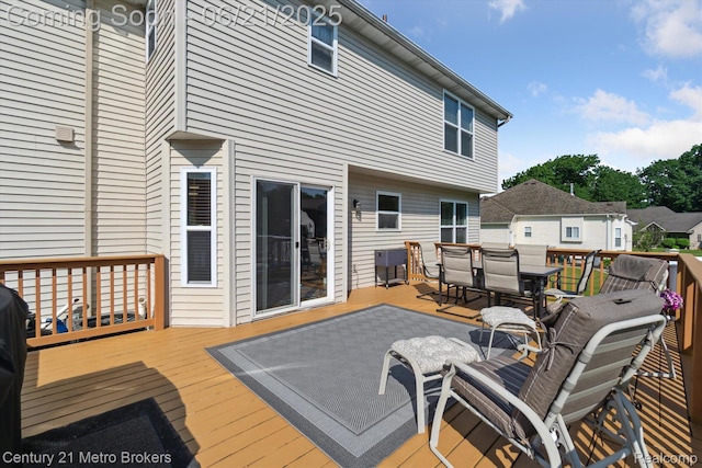 9145 Woodridge Dr, Davison, MI 48423 - wooden deck featuring outdoor dining space