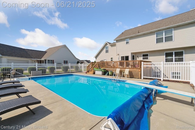 9145 Woodridge Dr, Davison, MI 48423 - view of swimming pool with a deck, a patio area, and a residential view