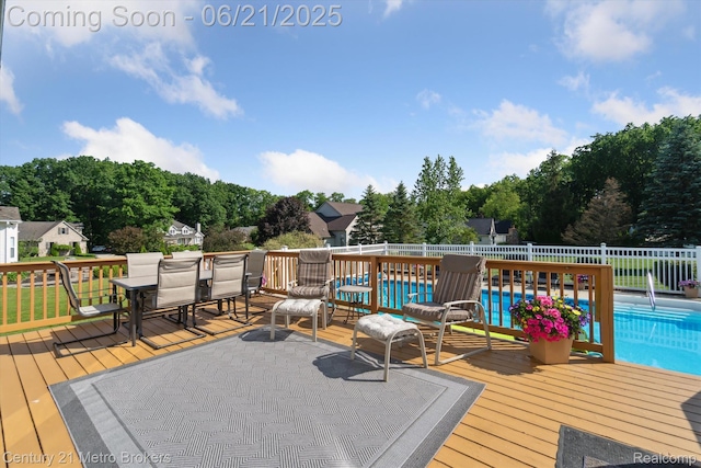 9145 Woodridge Dr, Davison, MI 48423 - deck featuring view of wooded area and outdoor dining space