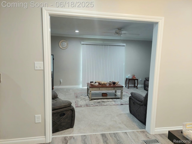 679 Judith St, Westland, MI 48186 - living area with ceiling fan, crown molding, and wood finished floors