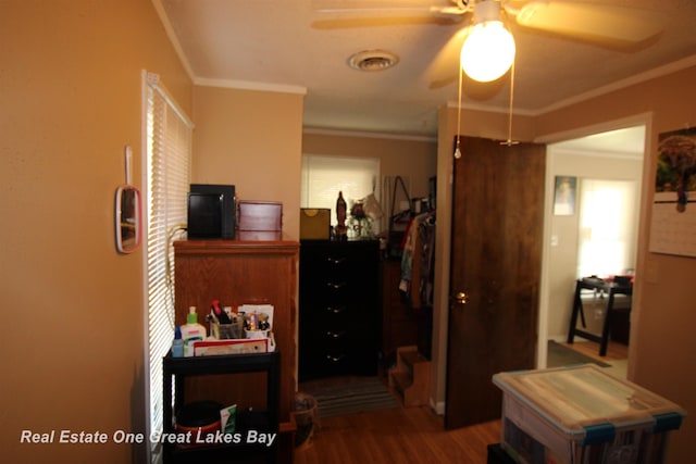 1521 Stanley St, Saginaw, MI 48602 - bedroom with wood finished floors and crown molding