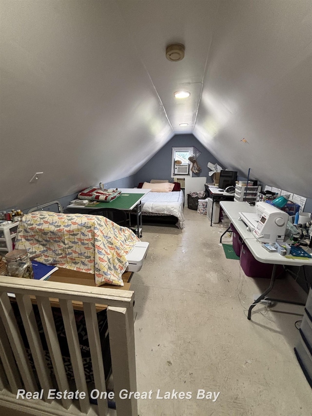 1521 Stanley St, Saginaw, MI 48602 - bedroom featuring vaulted ceiling and concrete flooring