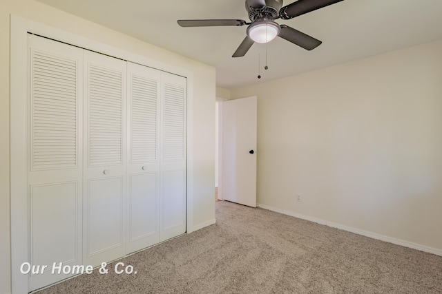 838 S Grey Rd, Midland, MI 48640 - unfurnished bedroom with carpet flooring, a closet, and ceiling fan