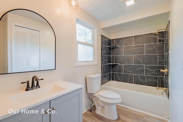 838 S Grey Rd, Midland, MI 48640 - bathroom featuring vanity, wood finished floors, and shower / tub combination