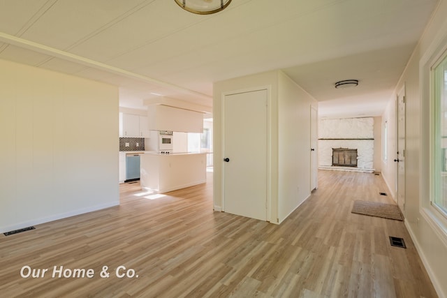 838 S Grey Rd, Midland, MI 48640 - hall with light wood finished floors and baseboards