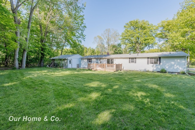 838 S Grey Rd, Midland, MI 48640 - view of grassy yard featuring a deck