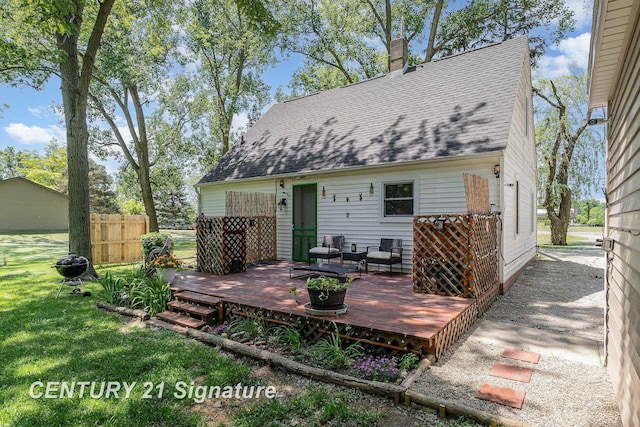 5430 N Center Rd, Saginaw, MI 48604 - rear view of property with a deck, roof with shingles, and a chimney