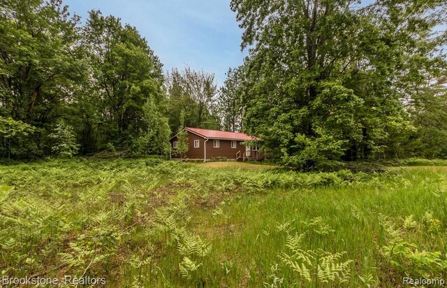 5776 Northover Cir, Elmira, MI 49730 - photo 3