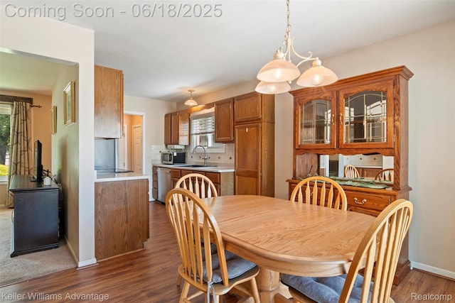 37862 Parkhurst St, Livonia, MI 48154 - dining space featuring dark wood finished floors and baseboards