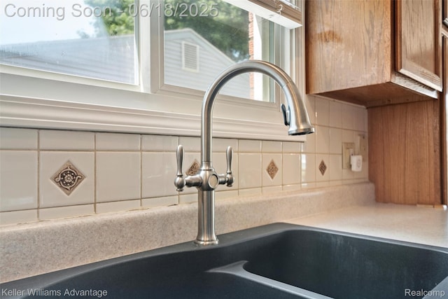 37862 Parkhurst St, Livonia, MI 48154 - kitchen view of backsplash and brown cabinets