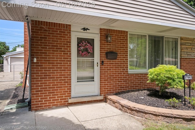 37862 Parkhurst St, Livonia, MI 48154 - property entrance with brick siding and covered porch