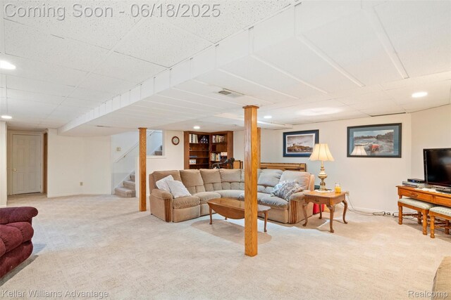 37862 Parkhurst St, Livonia, MI 48154 - living area featuring light carpet, stairs, a drop ceiling, and recessed lighting