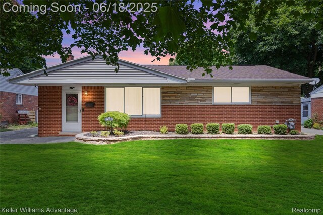 37862 Parkhurst St, Livonia, MI 48154 - view of front of home featuring a front yard and brick siding