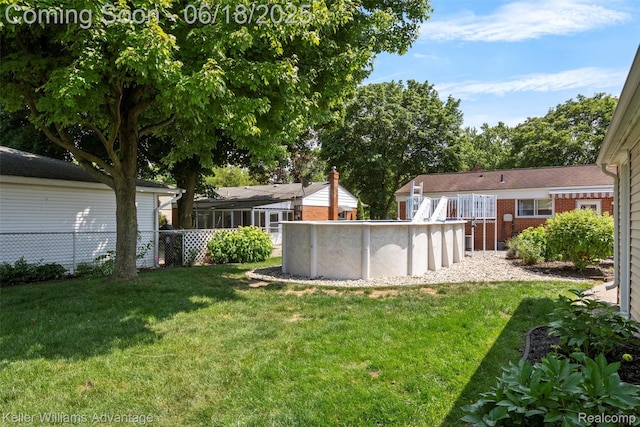 37862 Parkhurst St, Livonia, MI 48154 - view of yard with an outdoor pool