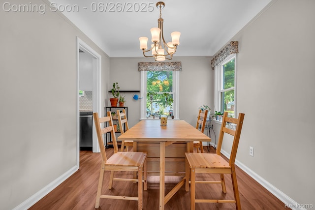 2734 Vassar St, Dearborn, MI 48124 - dining room with wood finished floors and a chandelier