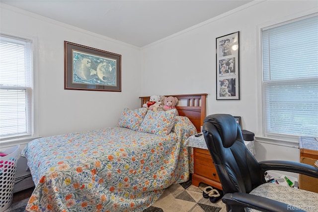 11228 Hudson Ave, Warren, MI 48089 - bedroom featuring multiple windows, crown molding, and a desk
