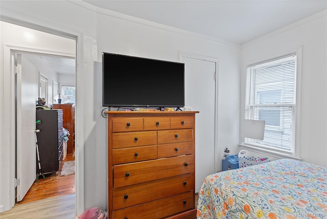 11228 Hudson Ave, Warren, MI 48089 - bedroom with light wood-type flooring and crown molding