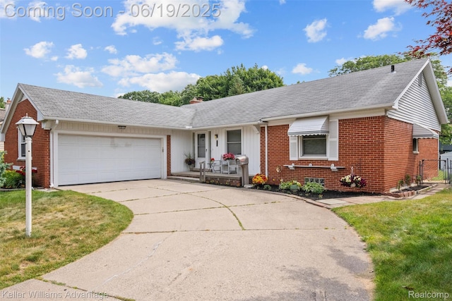 14000 Ellen Dr, Livonia, MI 48154 - view of front of house with brick siding, driveway, an attached garage, a front lawn, and roof with shingles