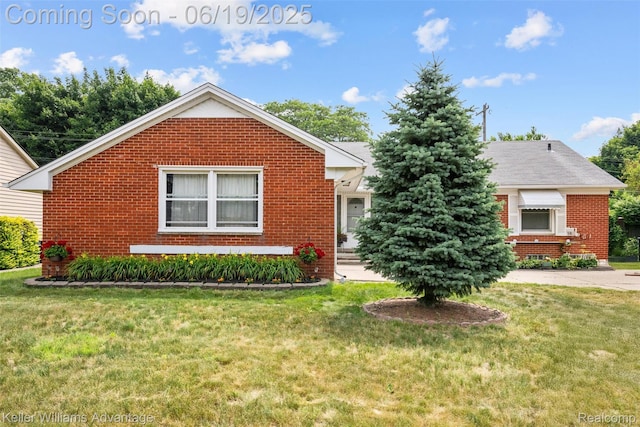 14000 Ellen Dr, Livonia, MI 48154 - view of front of property featuring brick siding and a front yard