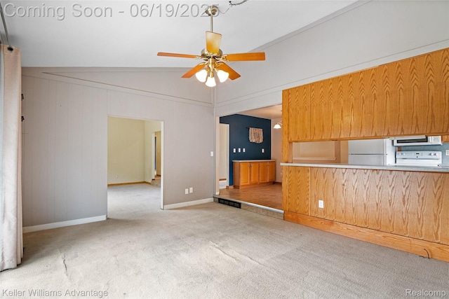 14000 Ellen Dr, Livonia, MI 48154 - unfurnished living room with carpet floors, ceiling fan, and vaulted ceiling