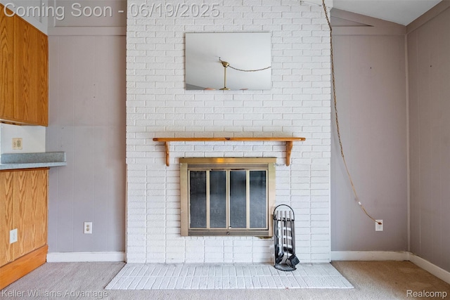 14000 Ellen Dr, Livonia, MI 48154 - detailed view of a brick fireplace and carpet flooring