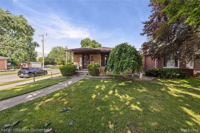 4401 Pardee Ave, Dearborn, MI 48125 - view of property hidden behind natural elements with brick siding and a front lawn