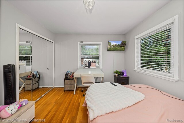 4401 Pardee Ave, Dearborn, MI 48125 - bedroom featuring light wood-type flooring and a closet