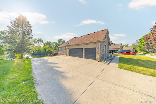 52615 Seven Oaks Dr, Shelby Twp, MI 48316 - view of property exterior with concrete driveway, a yard, brick siding, and a garage