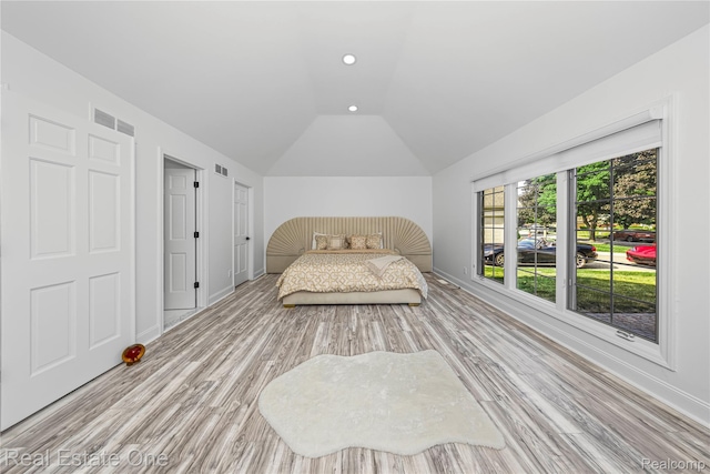 52615 Seven Oaks Dr, Shelby Twp, MI 48316 - bedroom with vaulted ceiling, light wood-style floors, and recessed lighting