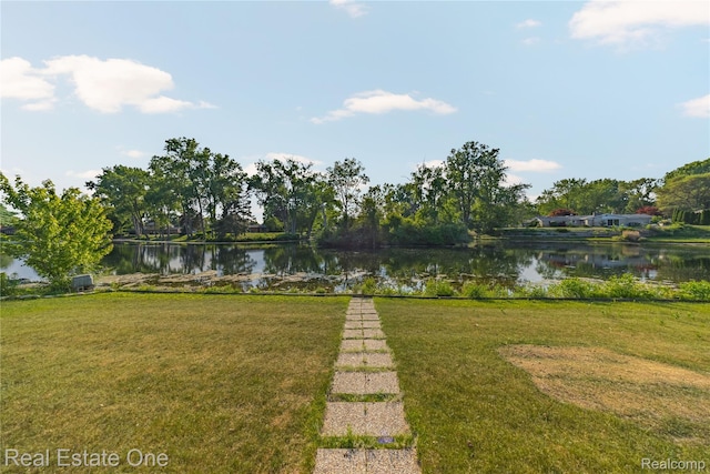 52615 Seven Oaks Dr, Shelby Twp, MI 48316 - view of green lawn featuring a water view