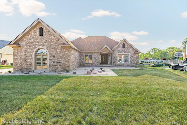 52615 Seven Oaks Dr, Shelby Twp, MI 48316 - view of front of house featuring a front lawn and brick siding