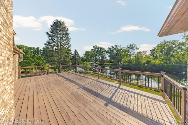 52615 Seven Oaks Dr, Shelby Twp, MI 48316 - wooden deck with a water view and view of wooded area