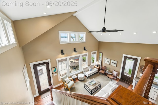11693 Kenton Dr, Whitmore Lake, MI 48189 - living room featuring high vaulted ceiling, ceiling fan, recessed lighting, and wood finished floors